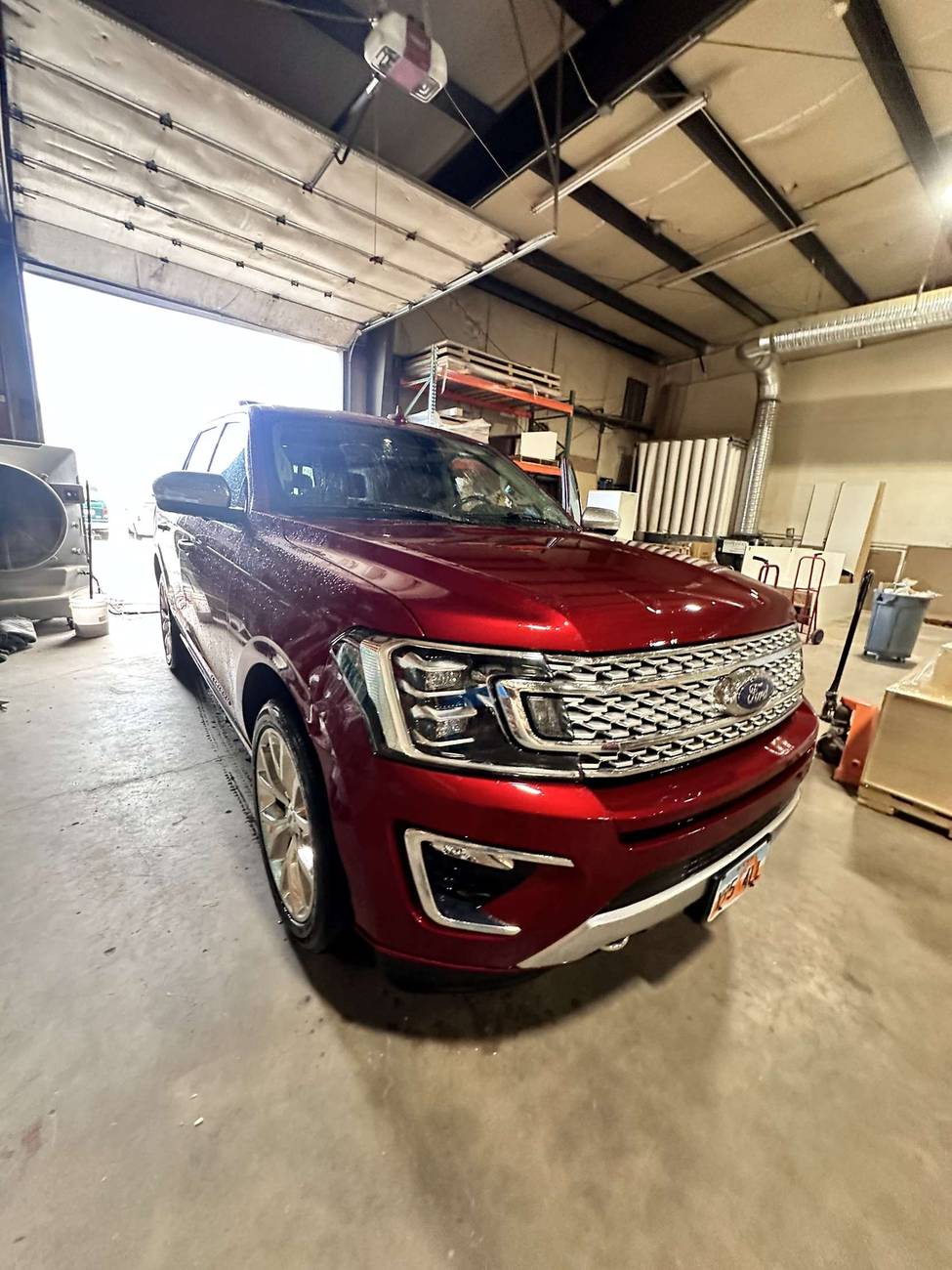 Red Ford Expedition after a full exterior detail