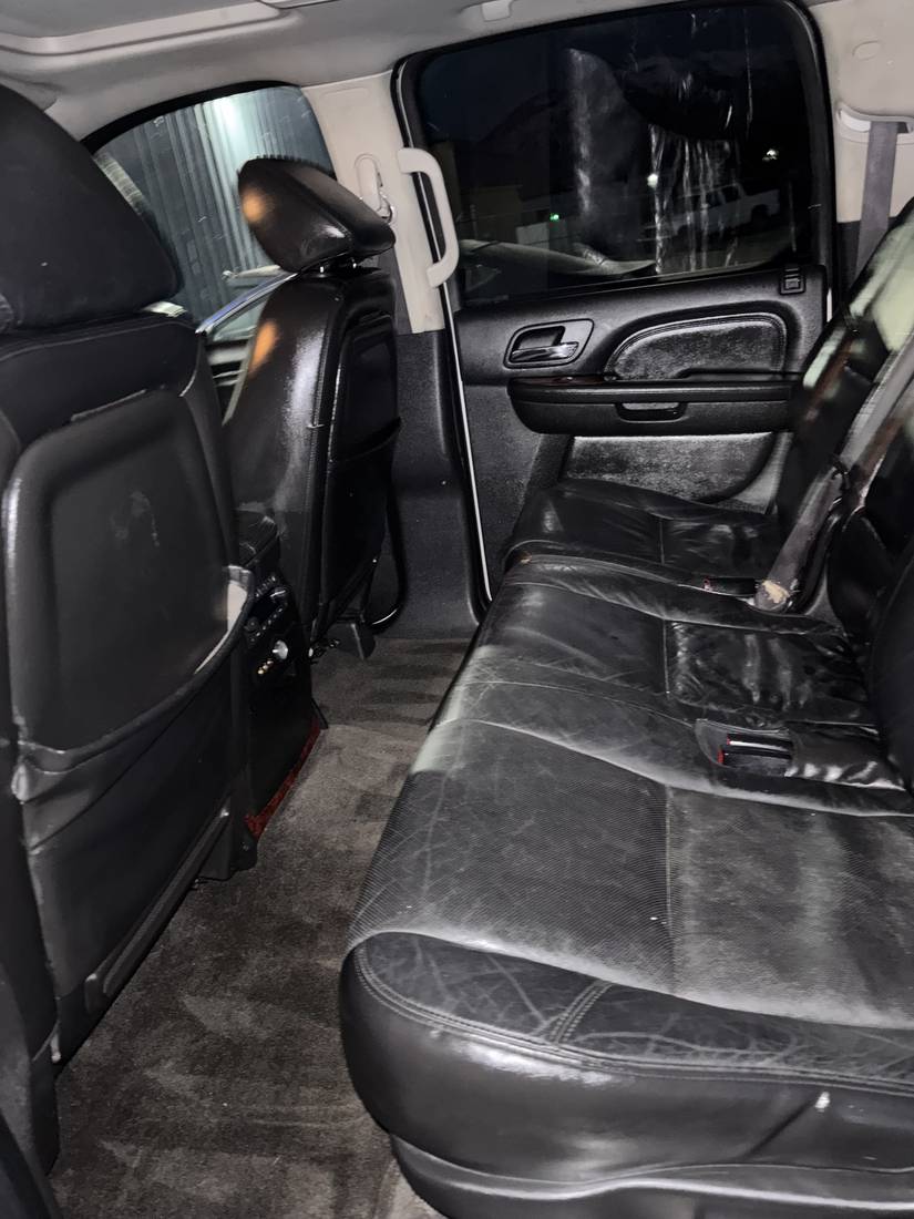 Vacuumed and detailed black leather rear seats