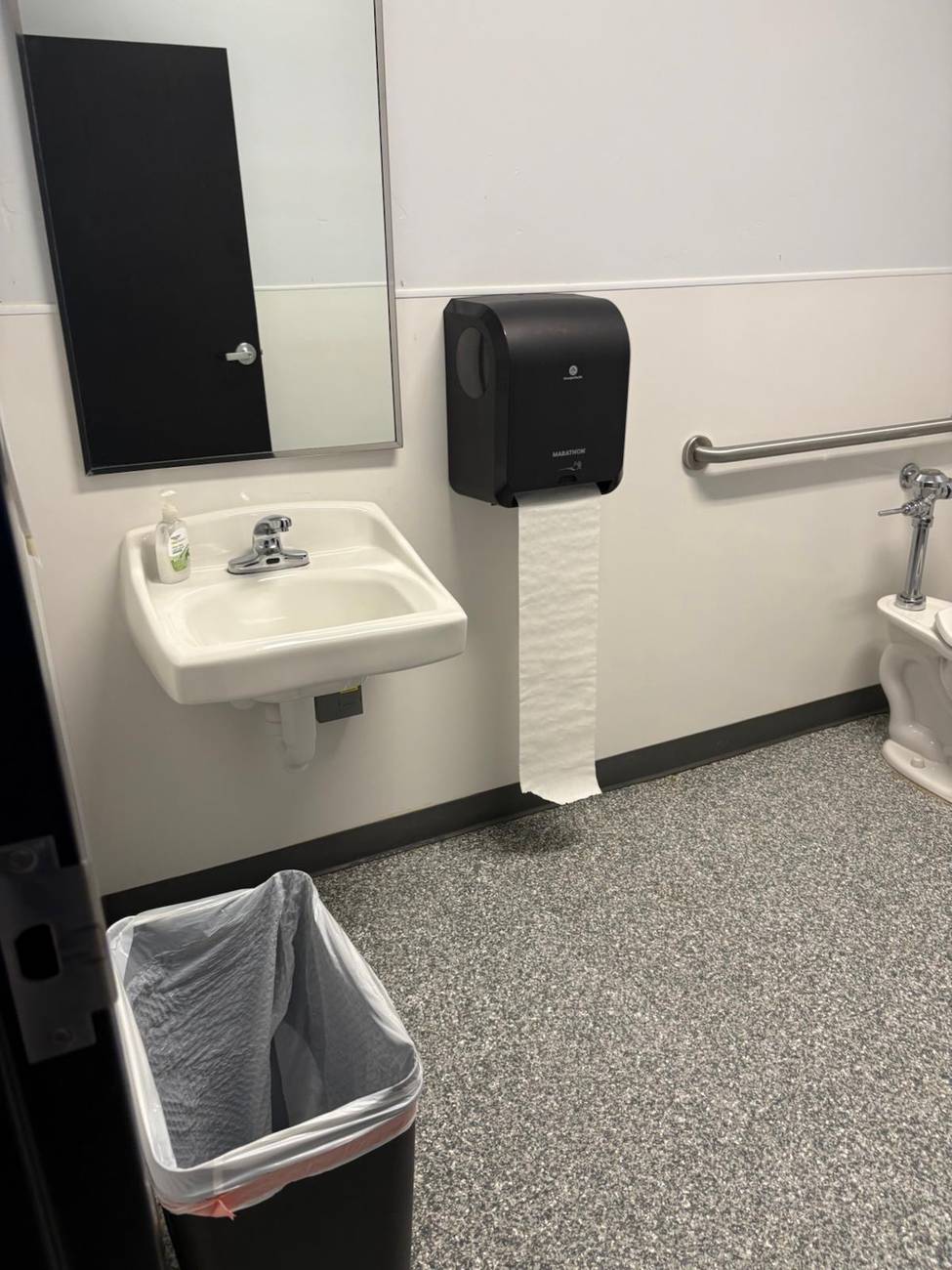 Clean, sanitized restroom with fresh supplies stocked