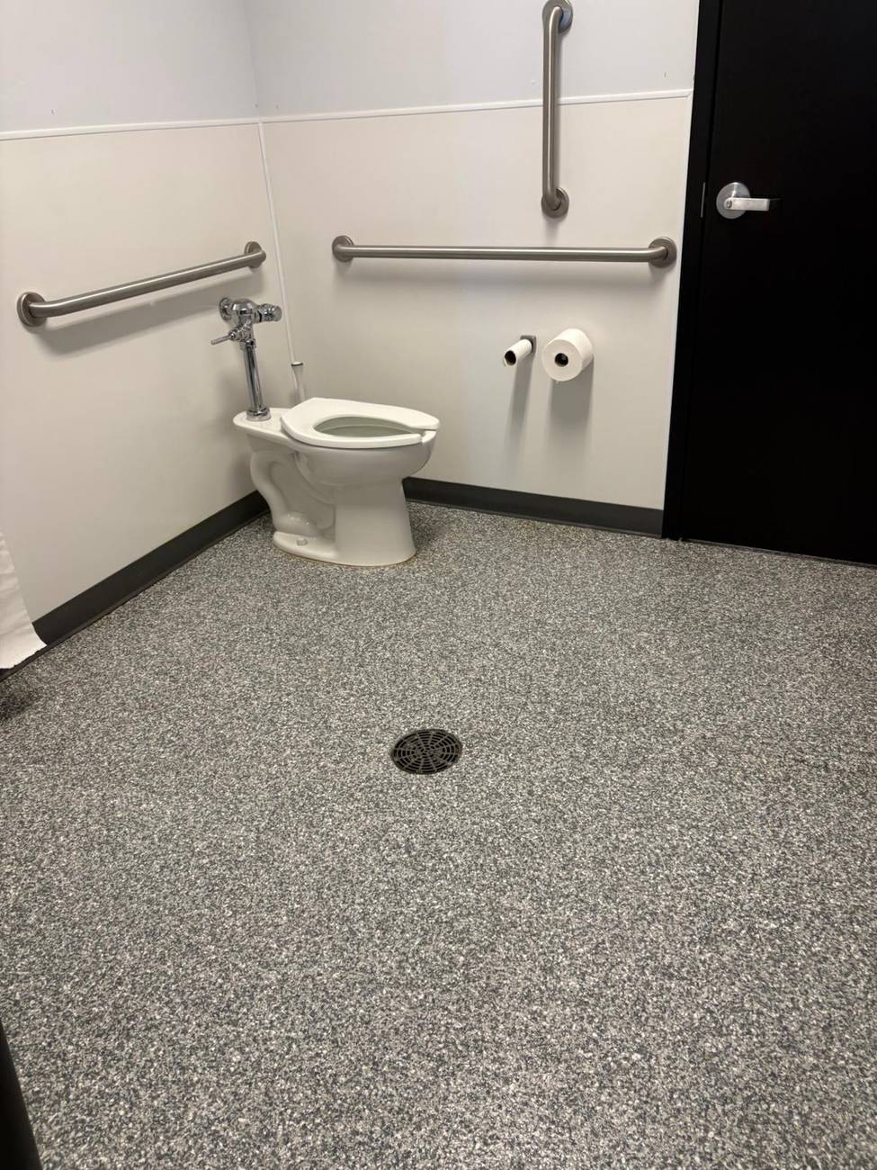 Spotless accessible restroom, floor to fixtures
