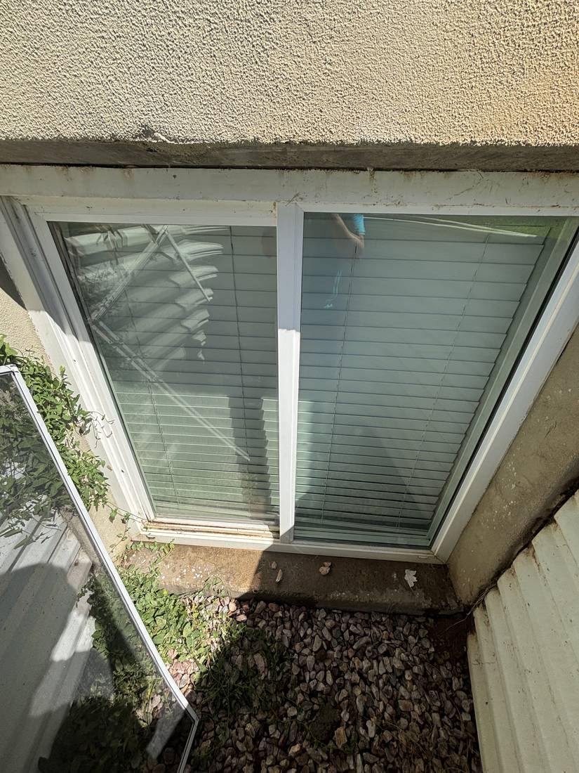 Clean streak-free window and screen on a home